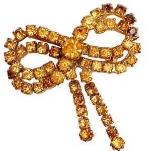 Vintage Mid Century Gold Tone Bow Brooch With Yellow Prong Set Rhinestones 1950s